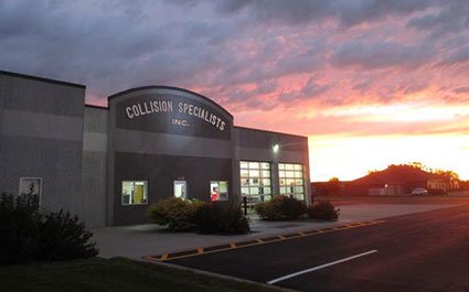 collision specialists building at dawn